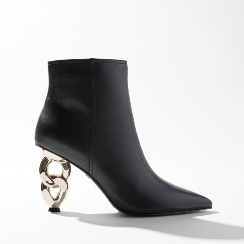 Black leather bootie with gold chain heel. Worn once